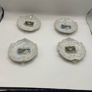 Set of four Panama decorative plates with gold trim